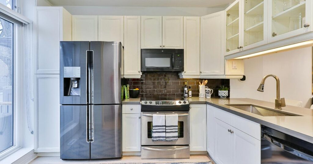 A broken kitchen appliance beside a simple repair or replace checklist for smart money decisions