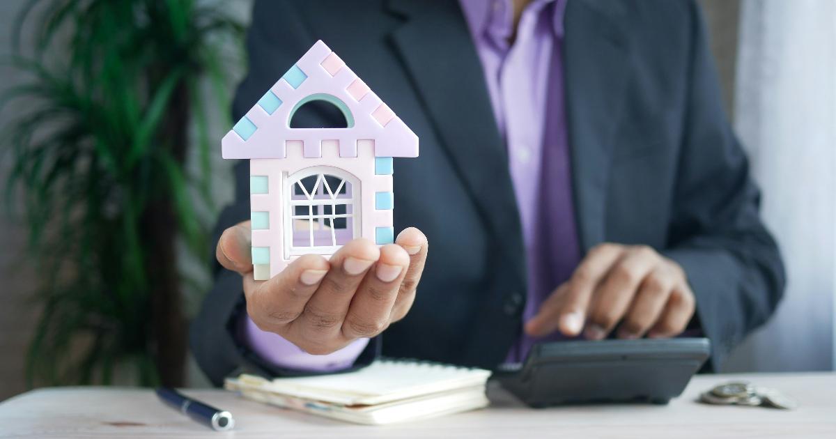 A homeowner reviewing mortgage statements and budgeting while a fixed rate mortgage ending approaches